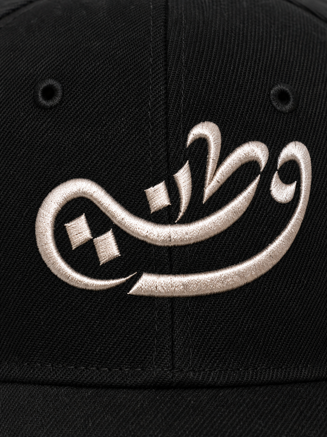 Black Cap Watany emblem