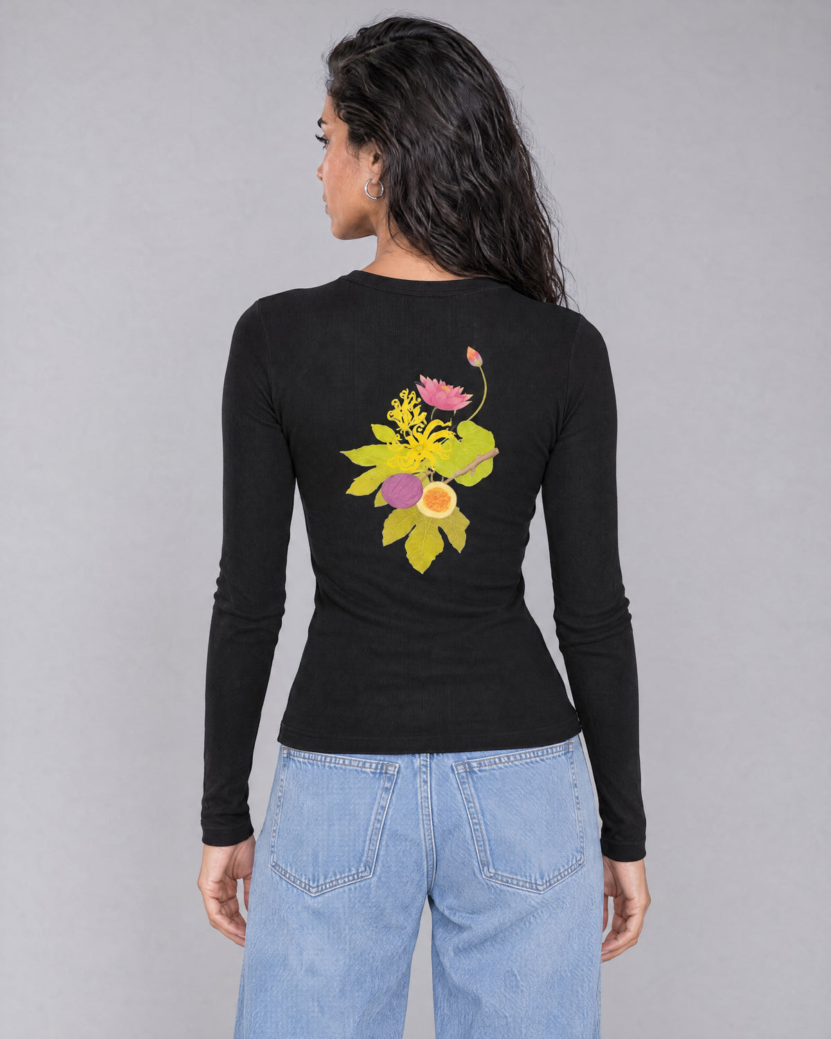 TIIN BABY TEE black long-sleeve top, back view with botanical artwork.